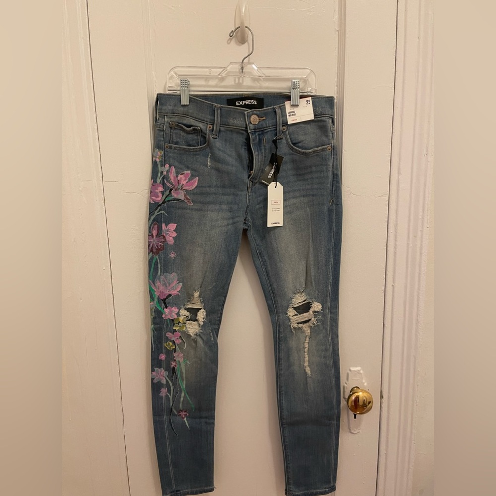 EXPRESS Skinny jeans with floral print on the one side. Very stylist.
